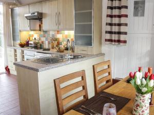 Una cocina o kitchenette en Rose Villa