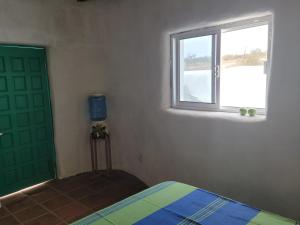 Postel nebo postele na pokoji v ubytování The O'asis