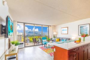 a kitchen and living room with a view of the city at Mountain View Getaway, Free Parking and Beach Steps Away in Honolulu +57 photos