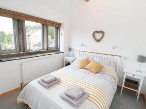 Postel nebo postele na pokoji v ubytování Bramble Cottage