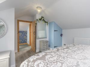 Postel nebo postele na pokoji v ubytování Rose Cottage