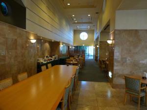 Restoran või mõni muu söögikoht majutusasutuses Kobe Luminous Hotel