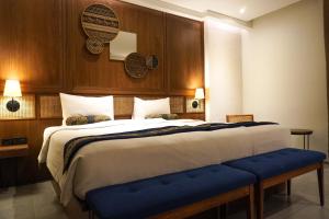 En eller flere senger på et rom på de JAVA Hotel Bandung