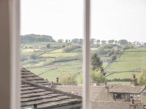 a view of a field from a window at The Attic in Keighley