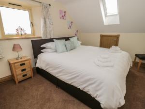 En eller flere senge i et værelse på Newton View + 25 billeder