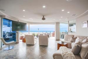 a living room with a view of the ocean at Ostend Escape in San Diego