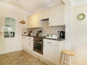 Køkken eller tekøkken på Sheila's Cottage + 9 billeder