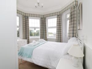 Ένα ή περισσότερα κρεβάτια σε δωμάτιο στο Flat 1, Cambridge Court