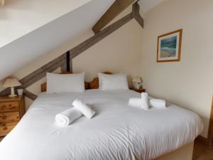 En eller flere senge i et værelse på George's House