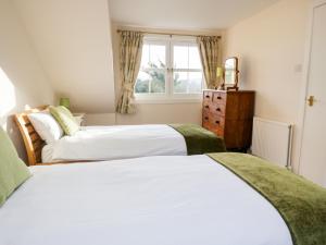 Tempat tidur dalam kamar di Cairnhill