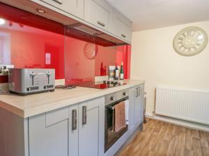 Kuchyň nebo kuchyňský kout v ubytování Dove Cottage