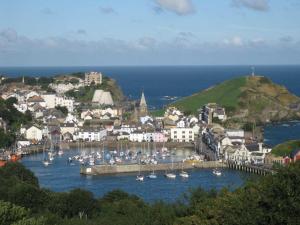 a group of boats docked in a harbor at SeaSound in Ilfracombe