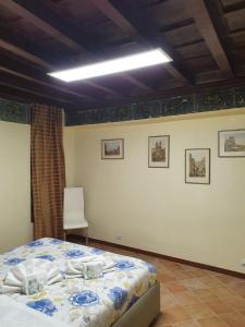 Posteľ alebo postele v izbe v ubytovaní Campo Marzio Exclusive Maison