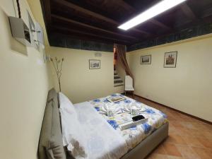 ローマにあるCampo Marzio Exclusive Maisonのベッドルーム1室(ベッド1台付)