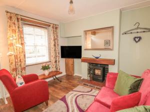 Et tv og/eller underholdning på Cloverleaf Cottage