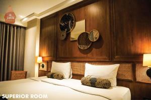 Lova arba lovos apgyvendinimo įstaigoje de JAVA Hotel Bandung