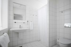 Koupelna v ubytování Tornøes Hotel + 29 fotografií