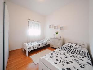 Postel nebo postele na pokoji v ubytování Apartment in Croatia near the Coast