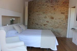 Posteľ alebo postele v izbe v ubytovaní Hostalet de Begur - Adults Only