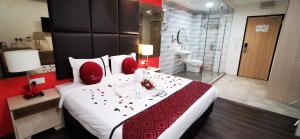 Postel nebo postele na pokoji v ubytování Seeds Hotel Ampang Point