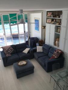 A seating area at Marina Capo Pino