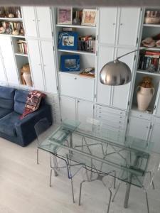A seating area at Marina Capo Pino