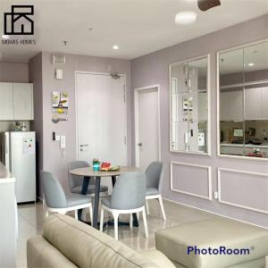 a kitchen and dining room with a table and chairs at Hyde Tower I-city by Mohas Homes in Shah Alam
