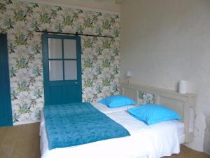 Katil atau katil-katil dalam bilik di Eco Logis de Chantegrolle