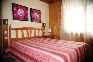 A bed or beds in a room at Apartamentos Varios Pas 3000