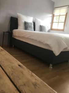 Postel nebo postele na pokoji v ubytování Ferienwohnung Nonntal