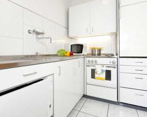 Kuchyňa alebo kuchynka v ubytovaní Tonis Appartement