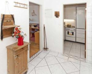 Kuchyňa alebo kuchynka v ubytovaní Tonis Appartement + 25 fotografií