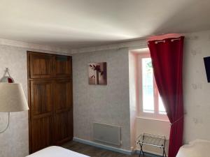 Postel nebo postele na pokoji v ubytování Hotel D'Albion