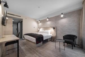 Posteľ alebo postele v izbe v ubytovaní DORMERO Hotel Budapest + 25 fotografií