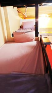 Letto o letti in una camera di Vanny's Peaceful Guesthouse