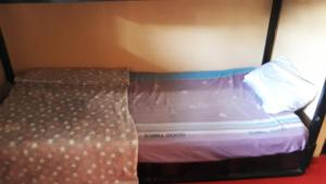 Letto o letti in una camera di Vanny's Peaceful Guesthouse