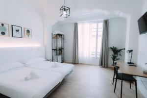 Postel nebo postele na pokoji v ubytování Concept Rooms