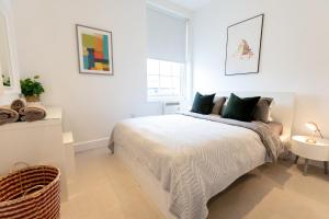 Katil atau katil-katil dalam bilik di Modern and Spacious 1 Bed Apartment City Centre