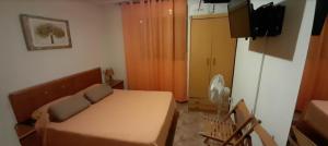 TV a/nebo společenská místnost v ubytování Apartamentos La Paz VIII