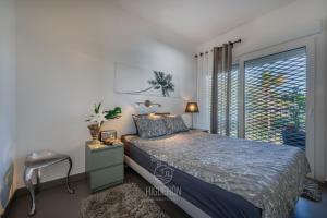 Posteľ alebo postele v izbe v ubytovaní HigueronRentals Gucci + 22 fotografií