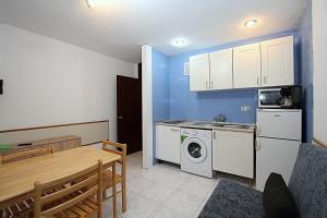 Kuchyňa alebo kuchynka v ubytovaní Apartment Bond