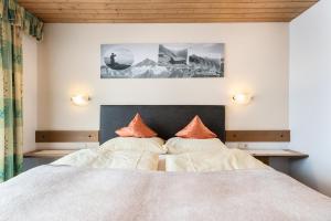 Letto o letti in una camera di Gasthof Pension Berghof