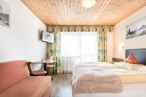 Letto o letti in una camera di Gasthof Pension Berghof