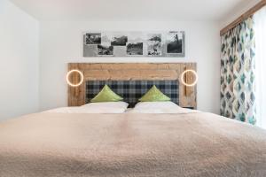 Letto o letti in una camera di Gasthof Pension Berghof