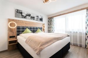 Letto o letti in una camera di Gasthof Pension Berghof