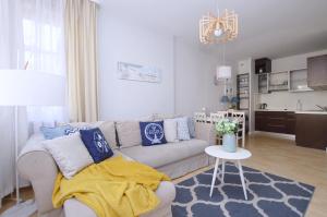 Kuchyňa alebo kuchynka v ubytovaní Victus Apartamenty, Apartament Family&Friends