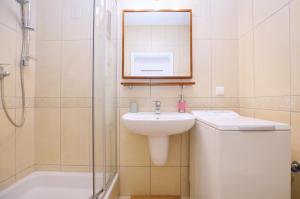 Kúpeľňa v ubytovaní Victus Apartamenty, Apartament Family&Friends