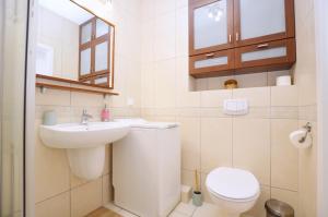 Kúpeľňa v ubytovaní Victus Apartamenty, Apartament Family&Friends
