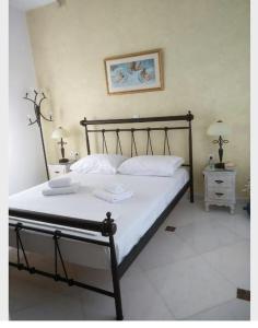 Postel nebo postele na pokoji v ubytování VERADA HOUSE