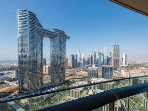 a view of a city from the top of a skyscraper at FIRST CLASS 3BR with full DUBAI SKYLINE & SEA view in Dubai